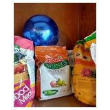 Top Shelf Full Of Garden Food, Fertilizer, Etc.