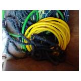 Bottom Shelf Full Of Hoses - Collapsible & Rubber