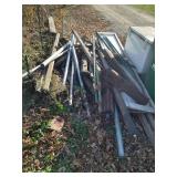 Scrap Lot Of Metal Fence Posts, Pipes, Wood Posts, And Railroad Ties