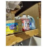 Top Shelf Full Of Scrap Wood, Chicago Electric Vibratory Bowl, Walnut Shells, Windshield Fluid, And Other Misc.