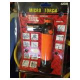 Box With Jumper Cables, Mini Pry Bar, Micro Torch, And Other Misc. Tools