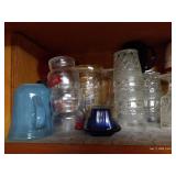 Cabinet Full Of Mugs, Corelle Dishes, And Crystal Glasses