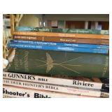 Stack of National Geographic Books and Atlas