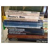 Stack of National Geographic Books and Atlas