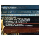 Stack of National Geographic Books and Atlas