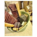Bucket of Push Broom Heads & Brushes