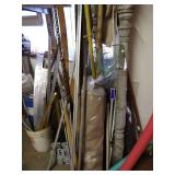 Large Lot of Items Against Wall