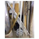 Large Lot of Items Against Wall