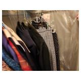 Rack of Designer Clothing & Sweater Shelf