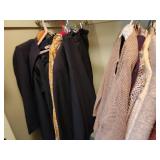 Rack of Designer Clothing & Sweater Shelf