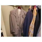 Rack of Designer Clothing & Sweater Shelf