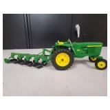 John Deere Model 3020 with a  4 bottom plow 1/16 Scale