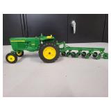 John Deere Model 3020 with a  4 bottom plow 1/16 Scale