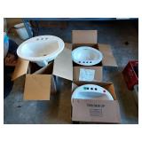 Three Unused Lavatory Sinks