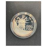 1986 Silver 100F Coin