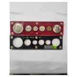 US Coin Set - no coins in one container and 6 coins in other