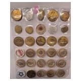 20 misc. tokens/wooden nickels in sheet
