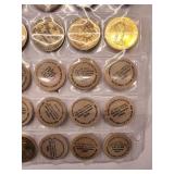 20 misc. tokens/wooden nickels in sheet