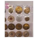 20 misc. tokens/wooden nickels in sheet
