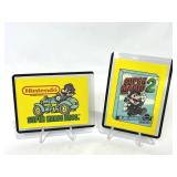 1989 Topps Nintendo Super Mario Bros. 2 (#1) Game Sticker Card & 1989 Topps Nintendo Super Mario Bros. (#33) Sticker Card