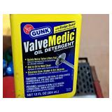 Lot of (9) Assorted Automotive Chemicals - ArmorAll, Turtle Wax, ValveMedic, RainX Washer Fluid, Black Magic Tire Wet, and more