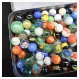 UNIQUE YELLOW AND BLUE TIN WITH MARBLES