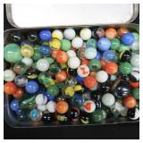 UNIQUE YELLOW AND BLUE TIN WITH MARBLES