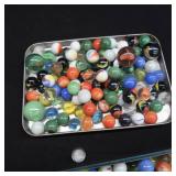 UNIQUE YELLOW AND BLUE TIN WITH MARBLES