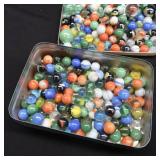 UNIQUE YELLOW AND BLUE TIN WITH MARBLES