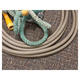 (2) Water Hoses and (2) Sprayers