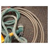 (2) Water Hoses and (2) Sprayers