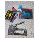 Stapler and Partially Full Boxes of Staples