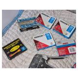 Stapler and Partially Full Boxes of Staples