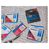 Stapler and Partially Full Boxes of Staples