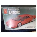Lamborghini Diablo model kit and a flat of die cast cars