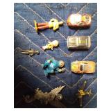 Micro cars, pocket watches, and mini characters