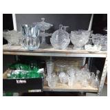 Shelf full of crystal and glassware