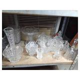 Shelf full of crystal and glassware