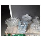 Shelf full of crystal and glassware