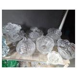 Shelf full of crystal and glassware