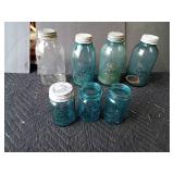 Blue Ball canning jars and 1 Atlas jar with vintage lids on some
