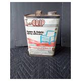 Gallon can of foam and fabric adhesive