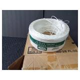 Partial roll of polyester tying twine