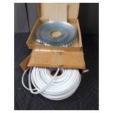Rolls of vinyl and metal tacking strip