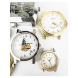 Group of 6 Quartz Analog Watches. Need Bands. New Batteries Installed. All working.