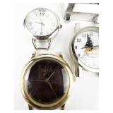 Group of 6 Quartz Analog Watches. Need Bands. New Batteries Installed. All working.