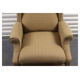 Elegant Wingback Armchair with Patterned Upholstery