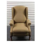 Elegant Wingback Armchair with Patterned Upholstery