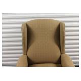 Elegant Wingback Armchair with Patterned Upholstery