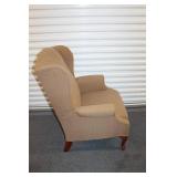 Elegant Wingback Armchair with Patterned Upholstery